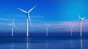 offshore,windmill,park,with,clouds,and,a,blue,sky,,windmill